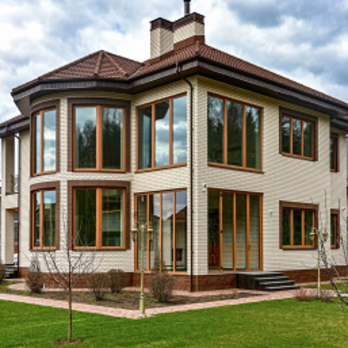 Коттедж с окнами REHAU